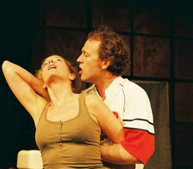 Jillian Bradbury (Kate) and Steve Gunn (Ben) in Crooked House's production of 'Breathing Corpses' by Laura Wade (August 2009). Pic: Peter Hussey
